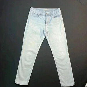 Levi women’s slimming skinny 5 pocket jeans, light wash size 8 petite